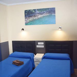 Habitación con 2 Camas Individuales